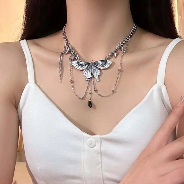 Butterfly rivet pendant necklace