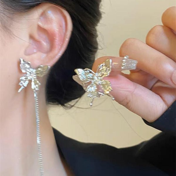 Butterfly pendant irregular tassels earrings