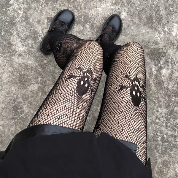 Star skull pattern fishnet tights